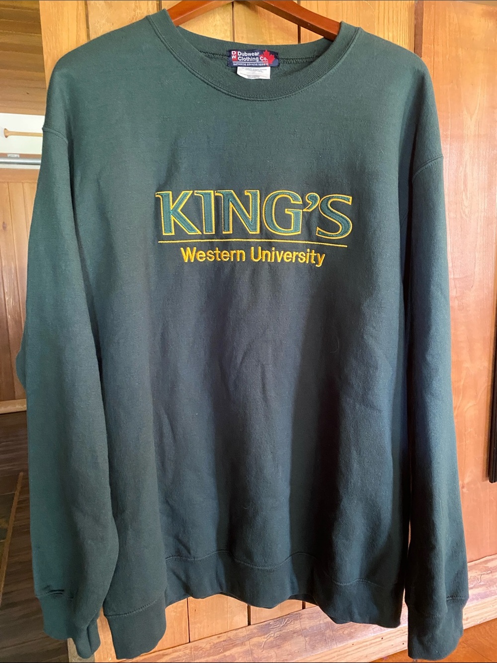 Kings Western University Forest Green Crewneck Sweatshirt with embroidered logo